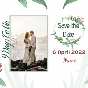 Wedding save the date announcement with a couple and floral wreath