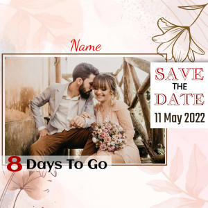 Couple embracing with wedding date announcement