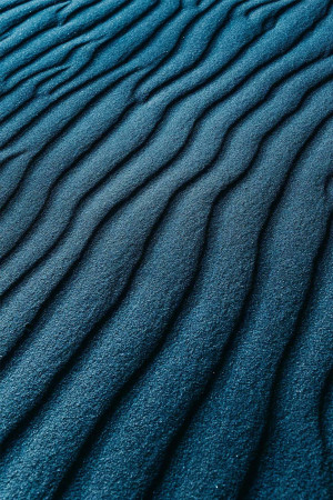 Close-up of textured blue sand dunes
