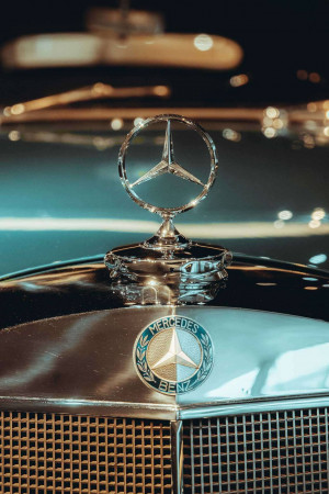 Close-up of a classic Mercedes-Benz hood ornament