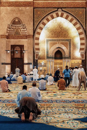 People praying inside the Sheikh Zayed Grand Mosque in Abu Dhabi