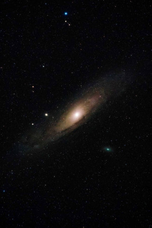 A stunning image of the Andromeda Galaxy, a spiral galaxy resembling our Milky Way.