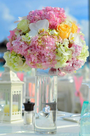 A close-up of a vibrant floral arrangement in a glass vase.