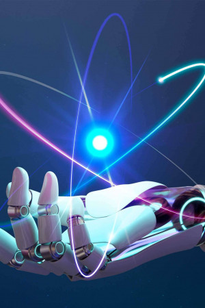 A robotic hand holding glowing energy orbits