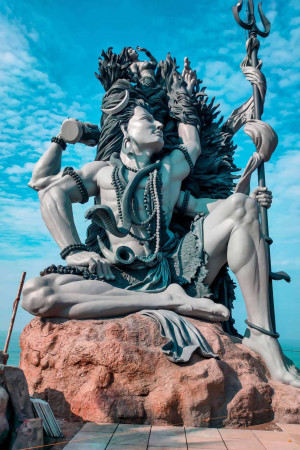 Large statue of Lord Shiva in a meditative pose