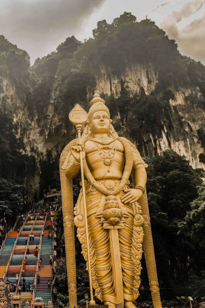 Golden statue of Lord Murugan at the entrance of Batu Caves, Malaysia