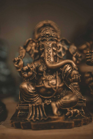 Close-up of a bronze Ganesh statue with intricate details