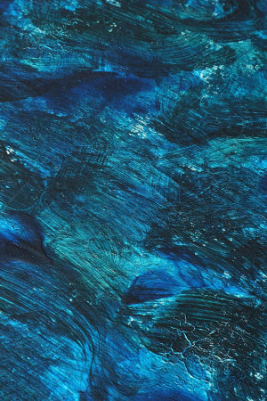 Close-up of textured blue paint strokes