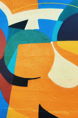 Colorful abstract geometric shapes painted on a wall