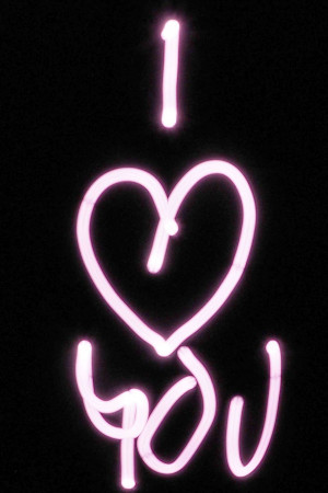 Neon sign displaying the phrase 'I Love You' with a heart shape.