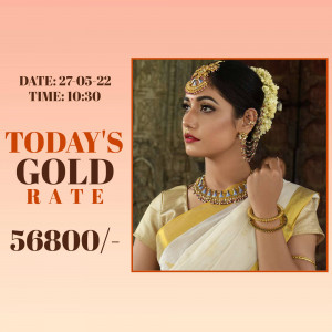 Indian woman adorned in gold jewelry with gold rate information.