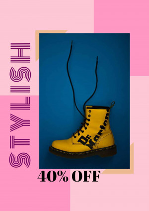 Yellow Dr. Martens boots with laces hanging, advertising a 40% off sale.