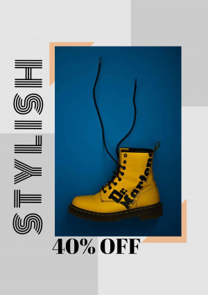 Yellow Dr. Martens boots with laces hanging, on a blue background with a sale promotion.