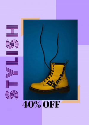 Yellow Dr. Martens boots with laces hanging, advertising a 40% off sale.