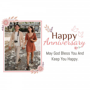 Anniversary greeting card with a couple's photo and floral decorations.