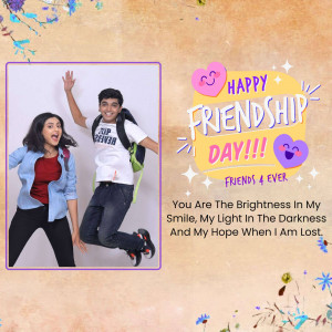Two friends jumping and celebrating Friendship Day with a decorative graphic.