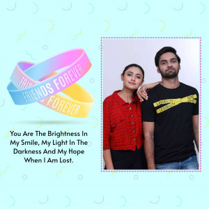 A couple posing together with a 'Friends Forever' themed design.