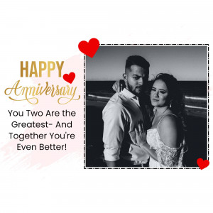 A couple celebrating their anniversary with a heart-themed graphic.