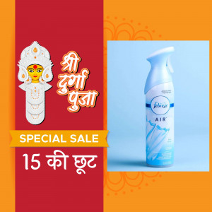 Fabreeze air freshener with Durga Puja themed background and sale offer.