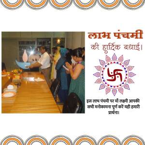 Image depicting a Laxmi Panchami celebration with people performing a puja.