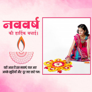 A woman creating a floral Rangoli for Navratri