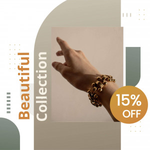 Close-up of a hand wearing a gold bracelet with a sale promotion.