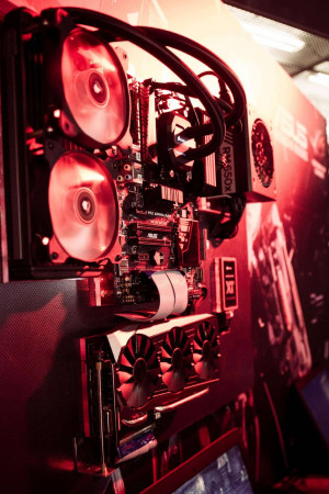 Close-up of a gaming computer with red RGB lighting