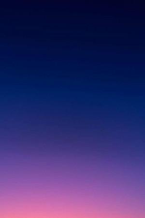 Abstract gradient background transitioning from dark blue to pink