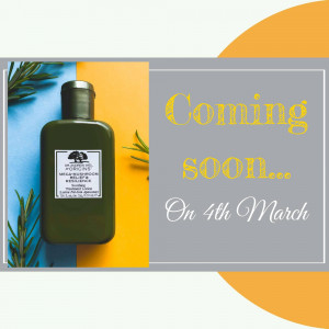 Origins product bottle with 'Coming Soon' text and launch date