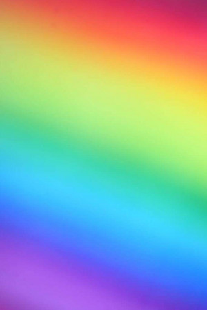 A smooth gradient of rainbow colors blending from red to violet.