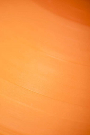 Abstract orange background with soft brush strokes