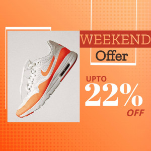 White and orange Nike Air Max sneaker on sale