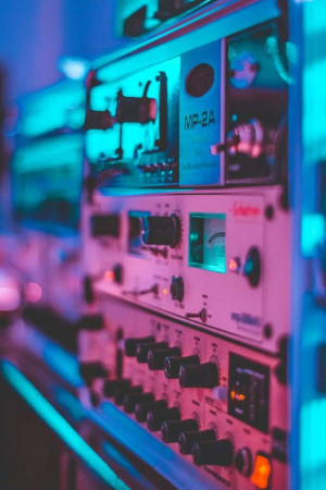 Close-up of vintage audio rack with neon lighting