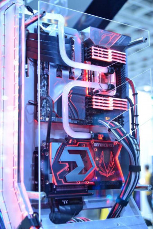 Close-up of a custom-built gaming PC with liquid cooling and RGB lighting