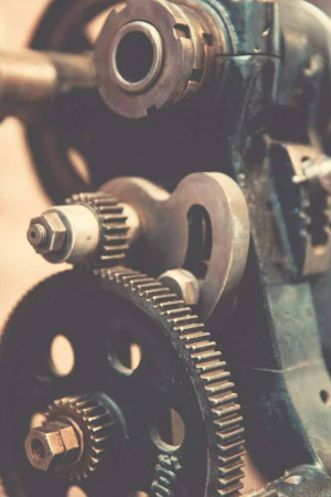 Close-up of antique machine gears and mechanical components