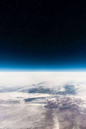 View of Earth's curvature and cloud cover from outer space