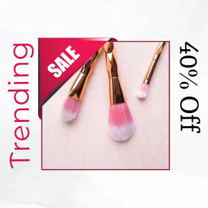 Close-up of makeup brushes with a sale promotion
