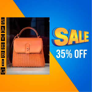 Close-up of an orange woven handbag with a sale promotion.