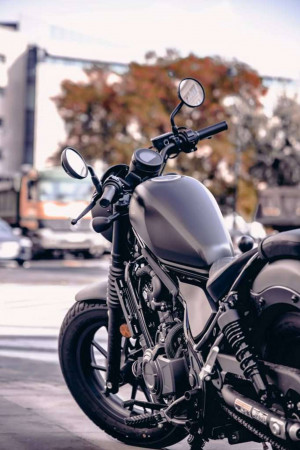 Close-up of a black motorcycle with blurred background