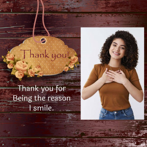 A thank you gift tag with a smiling woman in the background.