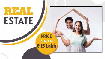 Couple holding a house roof cutout with real estate price promotion