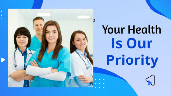 Group of doctors and nurses smiling at the camera