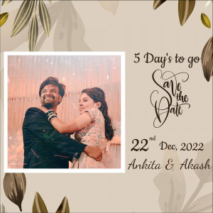 Save the Date card with a couple's photo and wedding details