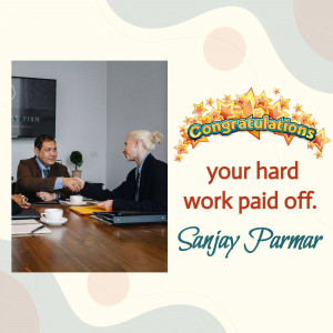 Two business professionals shaking hands with a congratulatory message.