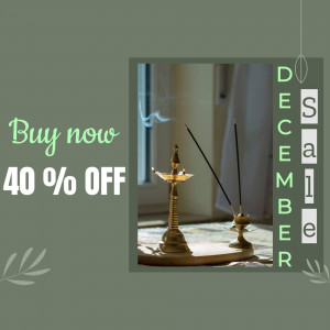 Traditional oil lamp with incense sticks and December sale promotion