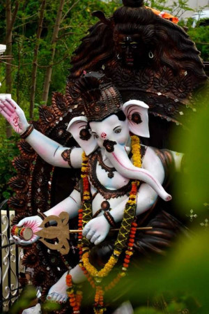 Close-up of a beautifully decorated Lord Ganesha idol during a festival