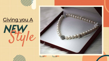 Pearl necklace in a red box with text 'Giving you a NEW Style'