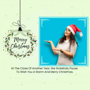 Woman in Santa hat holding out her hand with a Christmas wreath and text