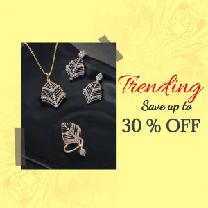 Gold and diamond leaf-shaped jewelry set on a black surface with a yellow background and sale promotion.