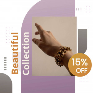 Close-up of a hand wearing a gold bracelet with a sale promotion.